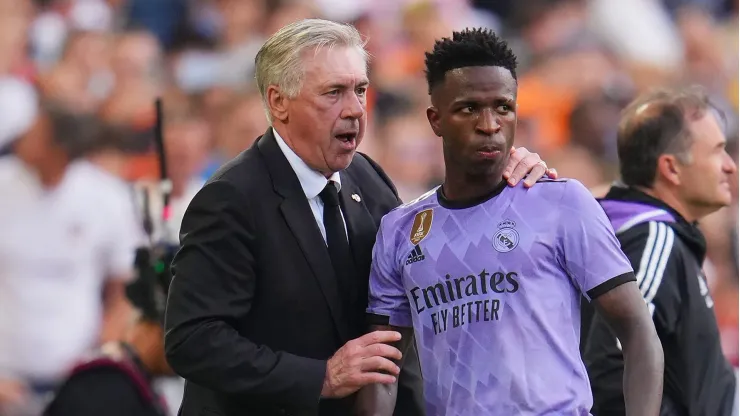 VALENCIA, SPAIN – MAY 21: Carlo Ancelotti, Head Coach of Real Madrid, interacts with Vinicius Junior of Real Madrid during the LaLiga Santander match between Valencia CF and Real Madrid CF at Estadio Mestalla on May 21, 2023 in Valencia, Spain. (Photo by Aitor Alcalde/Getty Images)
